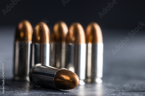 Foto Bullets ammunition on black background. still life concept.