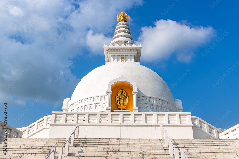 World Peace Stupa in Lumbini, Nepal. World Peace. The non-english text translates to nanmyouhourrnn, a Buddhist Script roughly translating to May Peace Prevail on Earth.