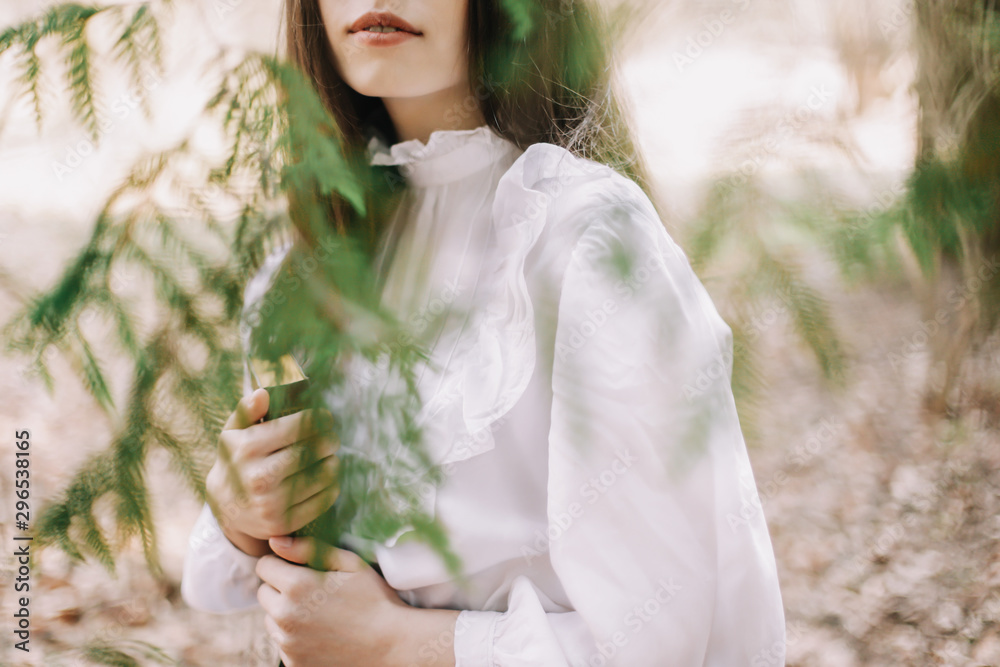 Beautiful dreamy girl portrait. Romantic portrait of a beautiful girl in the park Beautiful dreamy girl portrait. Romantic portrait of a beautiful girl in the park