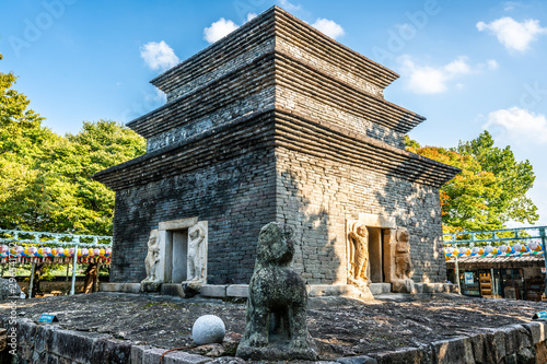 Ancient pagoda of Silla era at Bunhwangsa temple with blue sky in Gyeongju South Korea photo