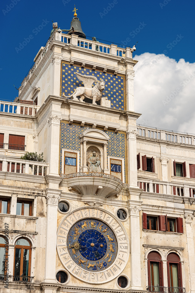 Venice, Clock and bell tower in Renaissance style in San Marco square with the statues called Mori di Venezia, UNESCO world heritage site, Veneto, Italy, Europe