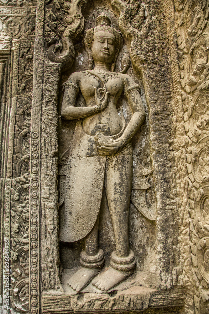 Sculptures of a beautiful woman on the wall of a temple in Angkor Wat, Cambodia Sculptures of a beautiful woman on the wall of a temple in Angkor Wat, Cambodia