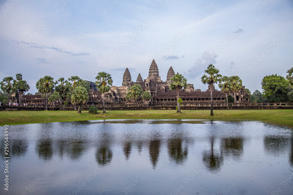 Naklejka premium The Angkor Wat temple reflected in the water, a Unesco heritage temple. Cambodia