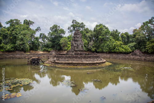 Ancient circular fountain filled with water from Angkor Wat, Cambodia