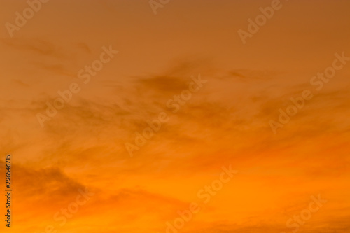 The background image of the evening sky has a beautiful golden light.