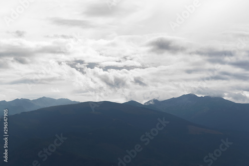 mountain covered by white clouds