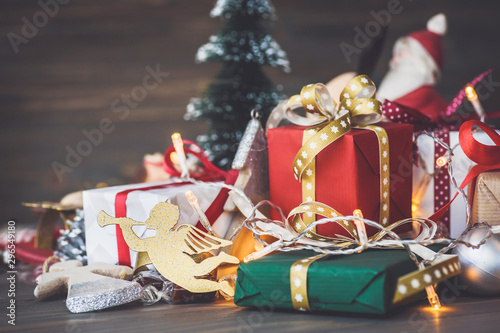 Christmas holiday decoration with gifts and ornaments. Background with copy space.
