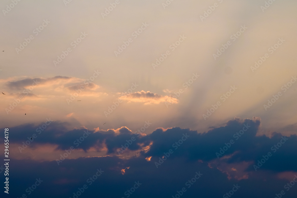 Beautiful Sunset Sky with Clouds and Sunlight