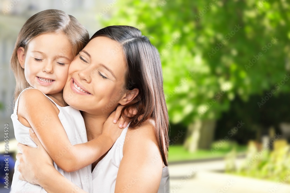 Happy Mother and daughter hugging