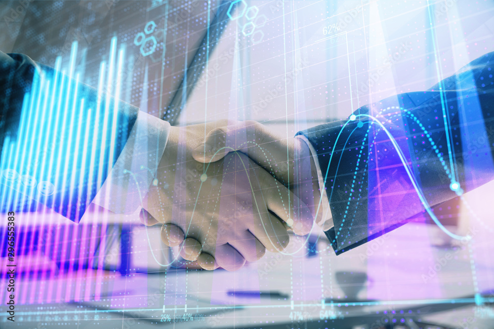 Obraz premium Multi exposure of financial graph on office background with two businessmen handshake. Concept of success in business