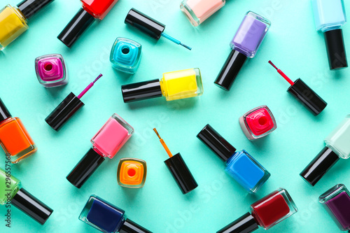 Nail polish bottles on blue background