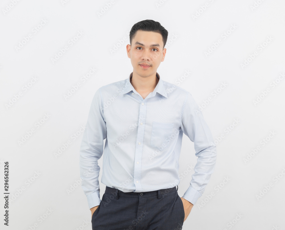 Young handsome asian business man looking to camera isolated on white background. Young handsome asian business man looking to camera isolated on white background.