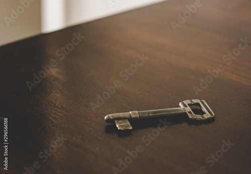 soft focus old iron key on wooden table background surface interior vintage environment   © Артём Князь