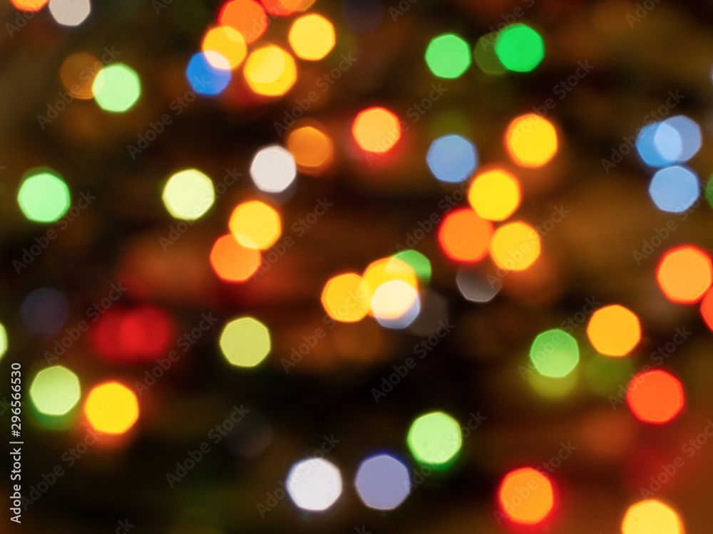 Fototapeta premium Christmas light background. Holiday glowing backdrop. Defocused Background. Blurred Bokeh.
