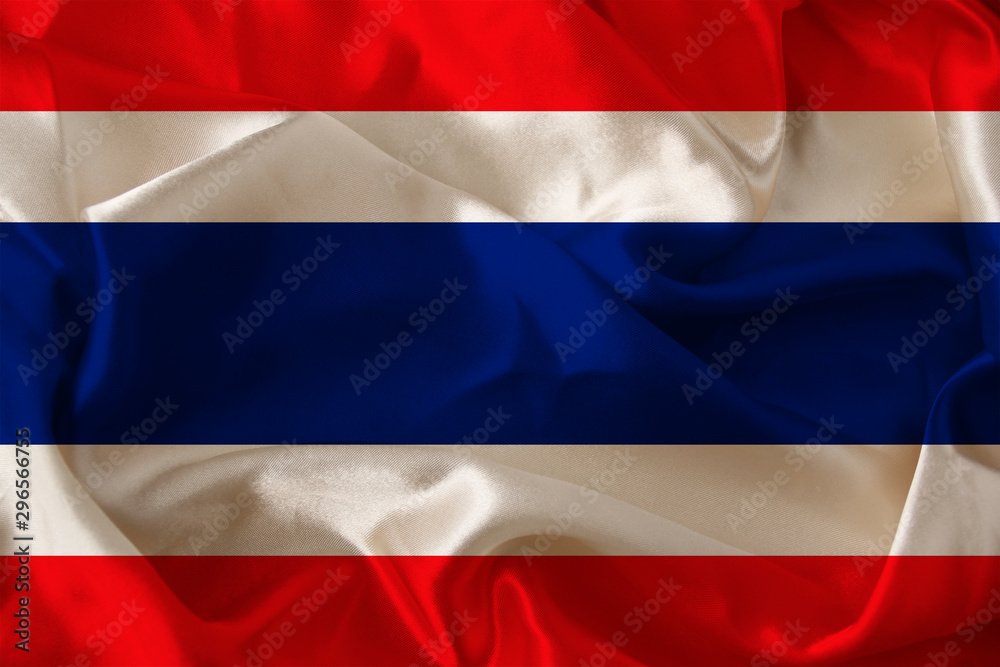 photo of the beautiful colored national flag of the modern state of Thailand on textured fabric, concept of tourism, emigration, economics and politics, closeup photo of the beautiful colored national flag of the modern state of Thailand on textured fabric, concept of tourism, emigration, economics and politics, closeup