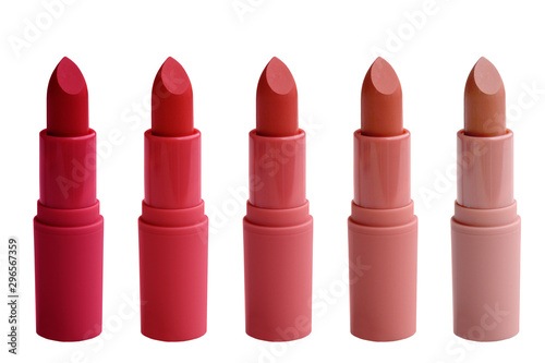 set of matte lipstick on a white isolated background, red, raspberry, pink, coral, peach color, close-up, the concept of decorative cosmetics photo
