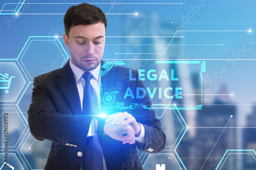 The concept of business, technology, the Internet and the network. A young entrepreneur working on a virtual screen of the future and sees the inscription: Legal advice