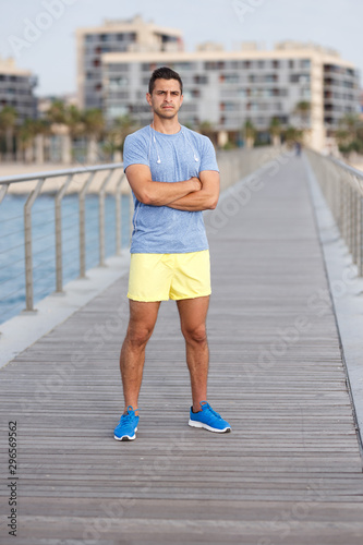 Sporty man posing outdoors