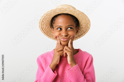 Image of amusing african american girl making smile with fingers