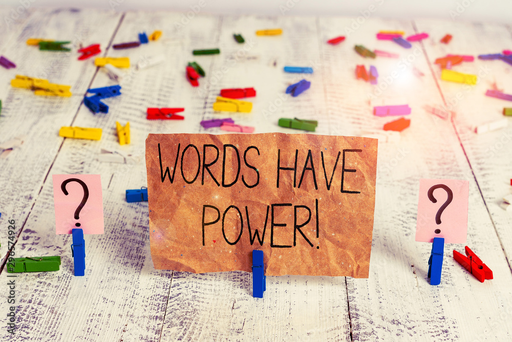 Text sign showing Words Have Power. Business photo text as they has ability to help heal hurt or harm someone Scribbled and crumbling sheet with paper clips placed on the wooden table