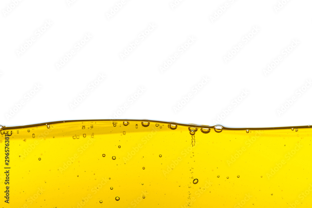 Beautiful wave of high viscosity of base oil and air bubble inside the oil isolated on white background, used as wallpaper, industrial concept Beautiful wave of high viscosity of base oil and air bubble inside the oil isolated on white background, used as wallpaper, industrial concept