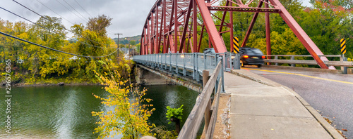 Bridge over Winooski River in autumn, Richmond, Vermont photo