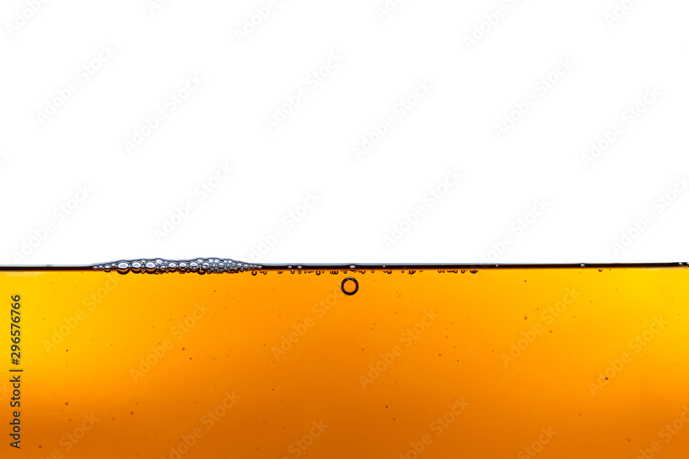 Beautiful wave of high viscosity of base oil and air bubble inside the oil isolated on white background, used as wallpaper, industrial concept Beautiful wave of high viscosity of base oil and air bubble inside the oil isolated on white background, used as wallpaper, industrial concept