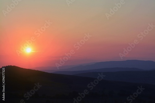 Fototapeta Naklejka Na Ścianę i Meble -  sunset over the mountains