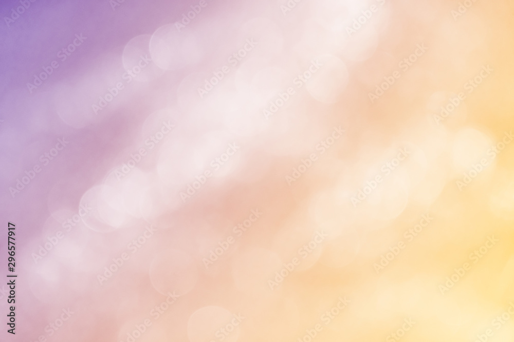 Purple, yellow, orange background with white bokeh Purple, yellow, orange background with white bokeh
