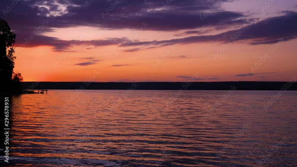Beautiful pink colors reflect off Lake. Idyllic picture. Beautiful pink colors reflect off Lake. Idyllic picture.