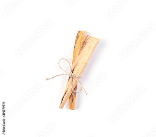 Two palo santo tree incense sticks isolated on white background. Esoteric concept.
