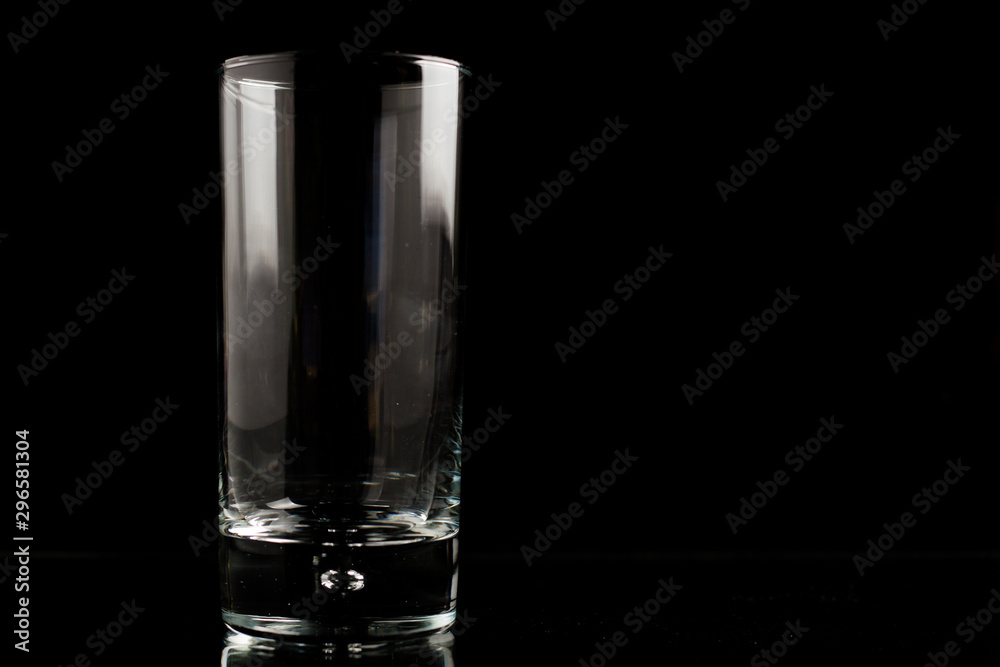 A glass of beer in a black scene A glass of beer in a black scene