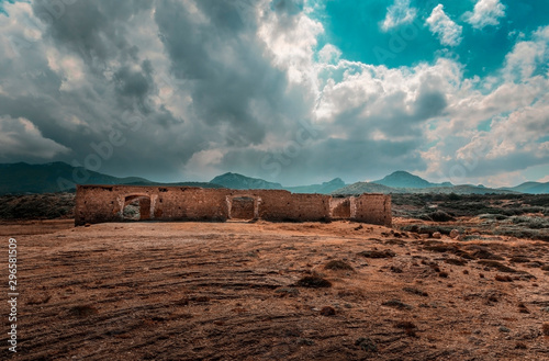Northern Cyprus Karpaz landscape with ruins against a cloudy sky