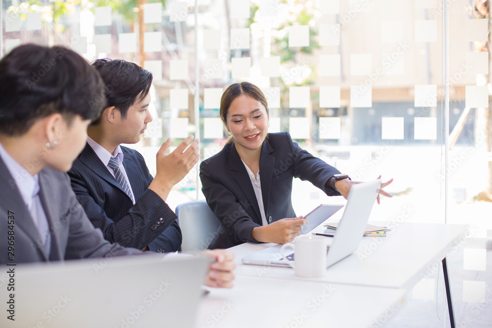 Start up concept,Start-up Asia business team in meeting and helped analyze the marketing problems of the company or beginning new project Start up concept,Start-up Asia business team in meeting and helped analyze the marketing problems of the company or beginning new project