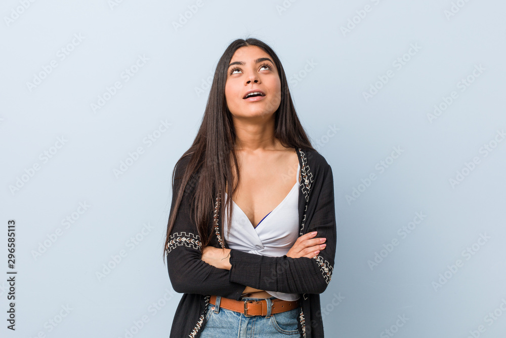 Young natural and pretty arab woman tired of a repetitive task. Young natural and pretty arab woman tired of a repetitive task.
