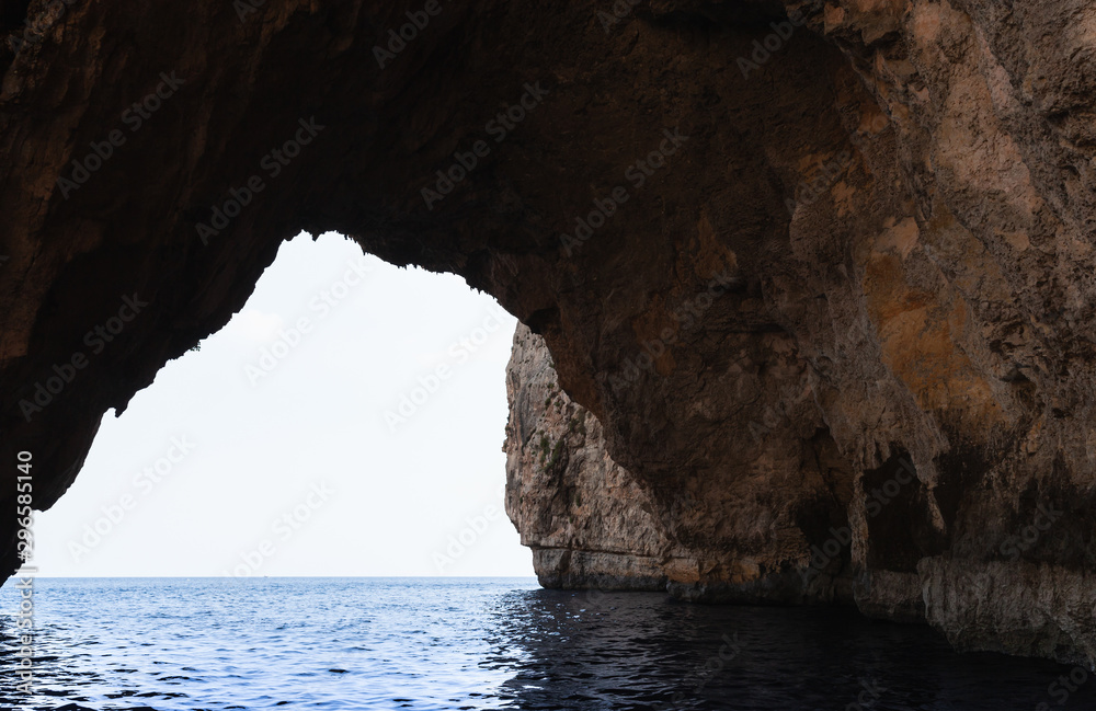 Cave in coastal rock. Blue Grotto
