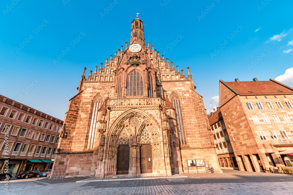 View of the Frauenkirche Church on the market square at sunset in Nuremberg. Tourist attractions in Germany
