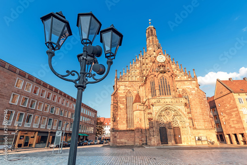 View of the Frauenkirche Church on the market square at sunset in Nuremberg. Tourist attractions in Germany