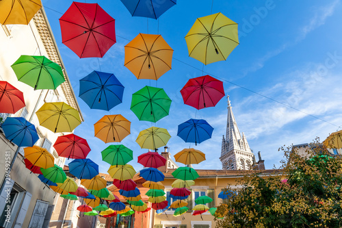 Fototapeta Naklejka Na Ścianę i Meble -  16 AUG 2019 - Gap, Hautes-Alpes, France - Colored umbrellas