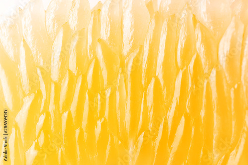 Bright juicy citrus pulp close-up. High-quality image is suitable for topics: healthy lifestyle, vitamins, proper nutrition, diet, summer, fresh juices. Background fruit texture.