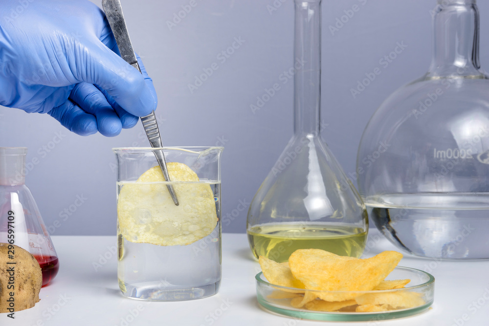 Food safety laboratory procedure, analysing potato chips from the market. Workplace lab