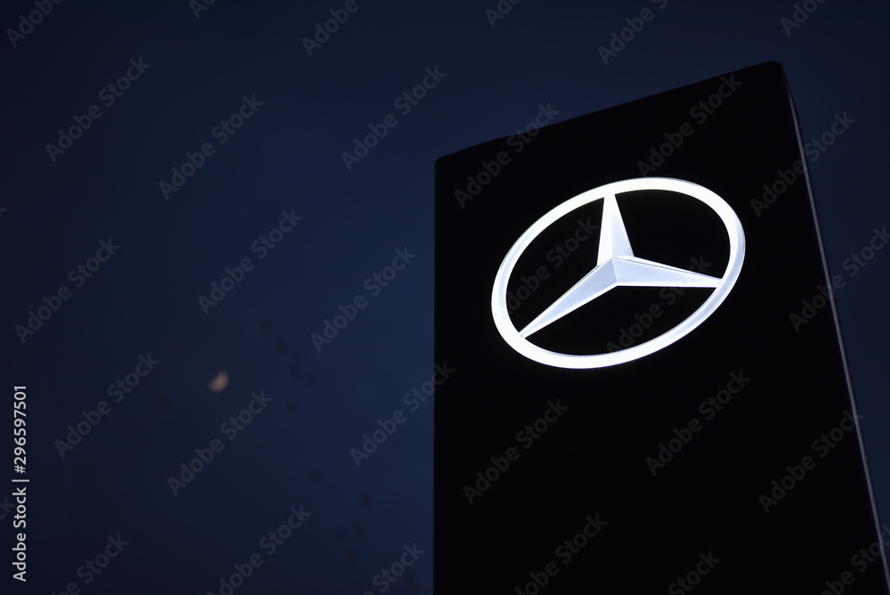 Kiev / Ukraine - 04.10.19: Logo of Mercedes-Benz car showroom in night on  background moon and flight birds Stock Photo | Adobe Stock