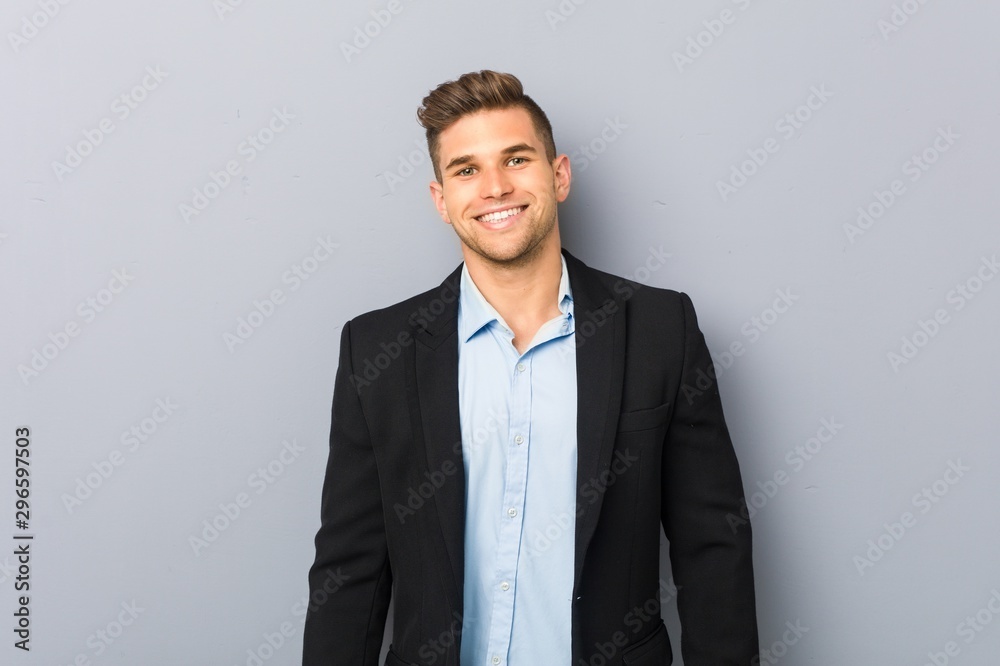 Young handsome caucasian man happy, smiling and cheerful. Young handsome caucasian man happy, smiling and cheerful.