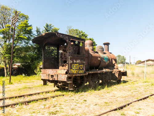 Old abandoned steam locomotive at the train station in the city of Valdivia. Chile