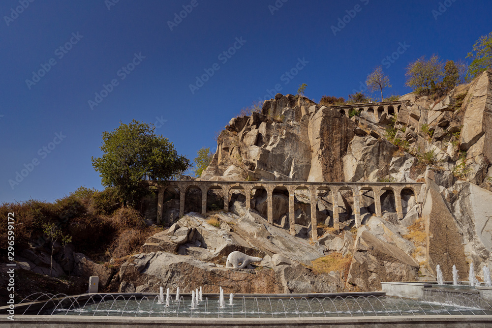 Fototapeta premium Ancient structure in the rocks with fountains in Plovdiv