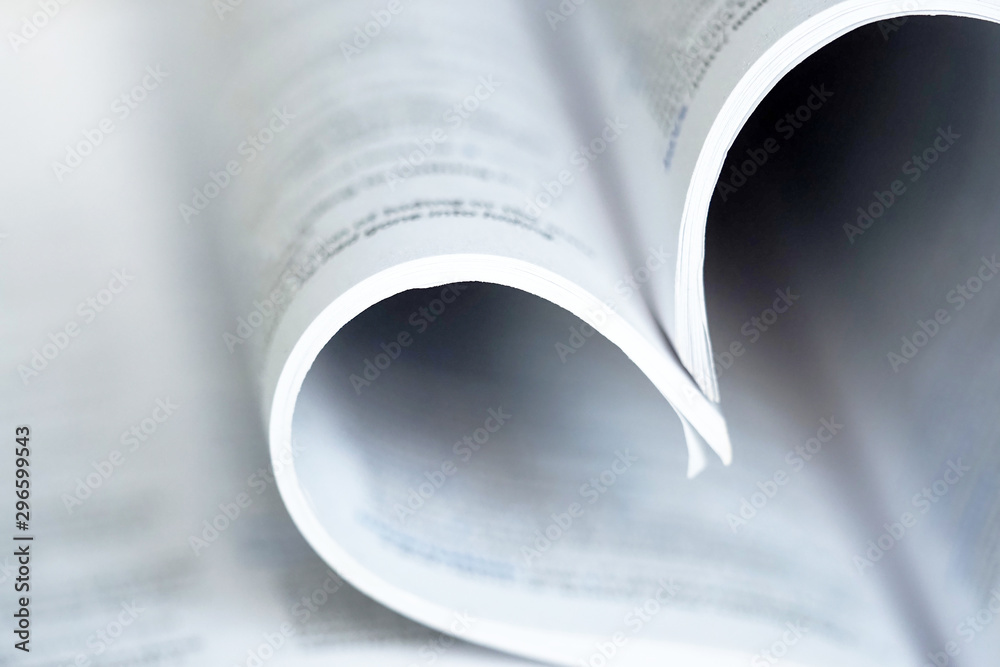 Fototapeta premium Open book, macro. Heart shaped book sheets