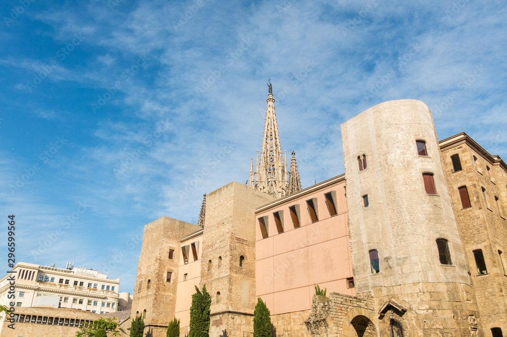View of the renovated square of the Cathedral, with the wall and the Roman towers. It is the Gothic cathedral and seat of the Archbishop. Barcelona, Spain.