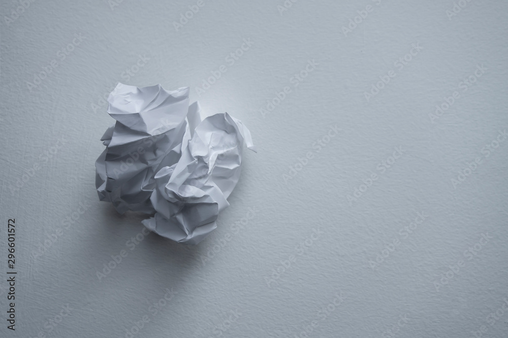Crumpled up thoughts on a sheet of paper. trashed discarded Crumpled up thoughts on a sheet of paper. trashed discarded