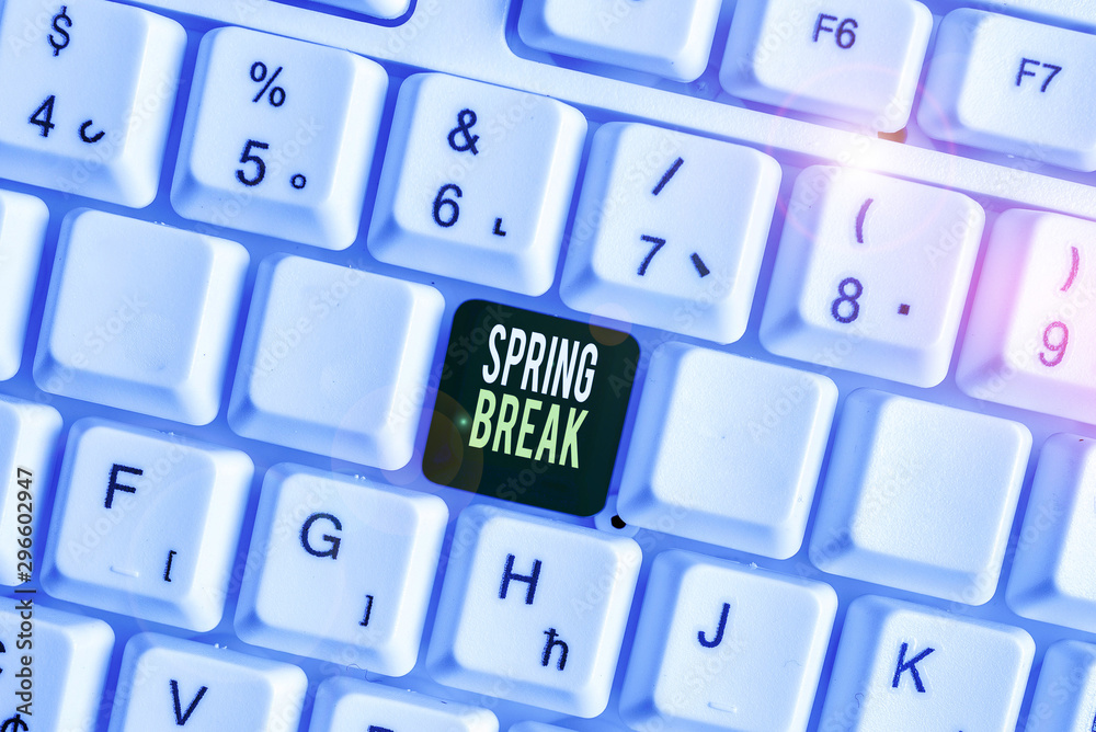 Handwriting text Spring Break. Conceptual photo Vacation period at school and universities during spring White pc keyboard with empty note paper above white background key copy space Handwriting text Spring Break. Conceptual photo Vacation period at school and universities during spring White pc keyboard with empty note paper above white background key copy space