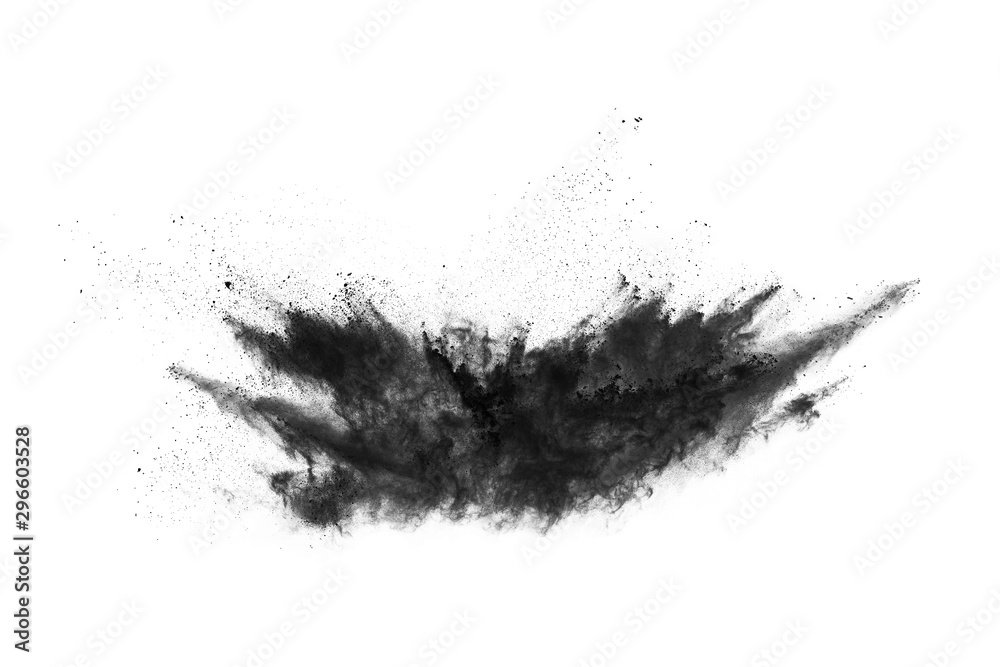 Closeup of black dust particles explode isolated on white background..